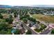 This neighborhood has tree-lined streets, well-maintained homes, green lawns, and proximity to walking trails at 312 Allen St, Golden, CO 80401