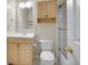 Bathroom with a vanity, toilet, and bathtub with shower, as well as a linen closet at 312 Allen St, Golden, CO 80401
