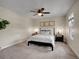 Cozy bedroom featuring a comfortable bed, soft carpet, and stylish nightstands, creating a peaceful retreat at 312 Allen St, Golden, CO 80401