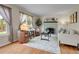 Inviting living room with hardwood floors, a brick fireplace, and comfortable seating for relaxing at 312 Allen St, Golden, CO 80401