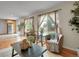 Bright living room with large windows, comfortable seating, and hardwood floors, perfect for relaxation at 312 Allen St, Golden, CO 80401