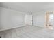 Large bedroom features multiple windows, carpeted floor, and neutral walls at 3464 N Irvington St, Aurora, CO 80019