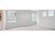 Bedroom features multiple windows, carpeted floor, and neutral walls at 3464 N Irvington St, Aurora, CO 80019