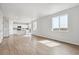 Spacious living room with hardwood floors, ample natural light, and open layout at 3464 N Irvington St, Aurora, CO 80019