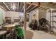 Finished basement converted into a music studio with instruments and exposed ceiling beams at 756 Kalamath St, Denver, CO 80204
