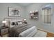 Calm bedroom with large bed, soft lighting, and art at 756 Kalamath St, Denver, CO 80204