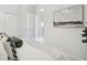 Bedroom featuring a minimalist design, serene artwork, and neutral color palette at 3101 Blake St # 309, Denver, CO 80205