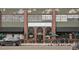 Exterior shot of Denver Central Market with large windows, brick accents, and decorative facade details at 3101 Blake St # 309, Denver, CO 80205