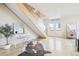Bright open space with a modern desk space with large windows and hardwood floors at 3101 Blake St # 309, Denver, CO 80205