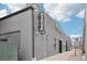 Exterior of Puttshack with brick facade and street-side entrance at 3101 Blake St # 309, Denver, CO 80205