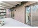 Spacious balcony with brick exterior, sliding glass doors, and views of the surrounding buildings at 460 S Marion Pkwy # 453, Denver, CO 80209