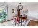 Dining room featuring a table with seating for four, a modern chandelier, and natural light at 460 S Marion Pkwy # 453, Denver, CO 80209