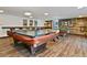 Spacious game room featuring a ping pong table, foosball table, and a pool table, perfect for entertainment at 460 S Marion Pkwy # 453, Denver, CO 80209