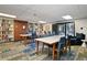Bright library area with extensive shelving, comfortable seating, and ample space for reading and studying at 460 S Marion Pkwy # 453, Denver, CO 80209