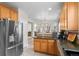 Modern kitchen with stainless steel appliances and island at 258 N Catawba Ct, Aurora, CO 80018