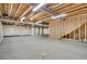 Unfinished basement with utilities ready for customization, offering plenty of potential at 9772 Taylor River Cir, Littleton, CO 80125