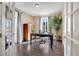 Well-lit home office with desk, built-in storage, and view at 9772 Taylor River Cir, Littleton, CO 80125