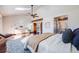 Main bedroom with hardwood floors, large windows, and ceiling fan at 16504 E Dorado Ave, Centennial, CO 80015