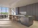 Modern kitchen with sleek countertops, stainless steel appliances, dark cabinets, island with seating, and natural light at 185 Steele St # 503, Denver, CO 80206