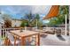 Relaxing back deck features an outdoor table with BBQ perfect for entertaining at 2330 Redwood Ave, Lafayette, CO 80026