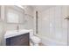 Updated bathroom with new vanity, modern fixtures, and tiled shower over tub at 2330 Redwood Ave, Lafayette, CO 80026