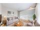 Comfortable living room with natural light, neutral tones, and a cozy seating area, great for relaxation at 2330 Redwood Ave, Lafayette, CO 80026