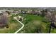 A large park with a playground, walking path, and green spaces at 2330 Redwood Ave, Lafayette, CO 80026