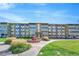 Charming multi-story apartment building with well-maintained landscaping at 9655 E Center Ave # 9D, Denver, CO 80247