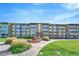Charming multi-story apartment building with well-maintained landscaping at 9655 E Center Ave # 9D, Denver, CO 80247