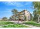 Charming multi-story apartment building with well-maintained landscaping at 9655 E Center Ave # 9D, Denver, CO 80247