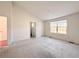 Bedroom with vaulted ceiling, window, and a closet with shelves at 246 Rockview Dr, Superior, CO 80027