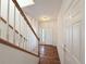 Hardwood floors, white walls, and a staircase leading upstairs at 246 Rockview Dr, Superior, CO 80027