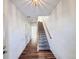 Hardwood floors and a staircase leading to the upper level at 246 Rockview Dr, Superior, CO 80027