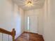 Bright entryway with hardwood floors, white walls, and a view of the staircase at 246 Rockview Dr, Superior, CO 80027