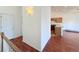 Open concept kitchen with island and hardwood floors at 246 Rockview Dr, Superior, CO 80027