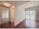 Open floor plan with wood floors and sliding glass doors to the outside at 246 Rockview Dr, Superior, CO 80027