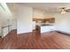 Open-concept living space with kitchen, living room, and dining area at 246 Rockview Dr, Superior, CO 80027