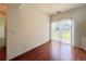 Bright living room with sliding glass doors and wood-look floors at 246 Rockview Dr, Superior, CO 80027