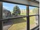Window view overlooking well-maintained lawn and neighboring homes at 246 Rockview Dr, Superior, CO 80027