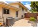 Spacious backyard with light-colored siding, privacy fence, and greenery at 1005 S Miller Way, Lakewood, CO 80226