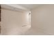 Large basement room with stairs and light colored carpet at 1005 S Miller Way, Lakewood, CO 80226