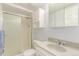 Bathroom features a shower, vanity, and medicine cabinet at 1005 S Miller Way, Lakewood, CO 80226