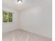 Bright bedroom with plush carpeting, large window and a closet at 1005 S Miller Way, Lakewood, CO 80226