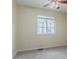 Bedroom featuring neutral walls, carpet, a window and a ceiling fan at 703 S Depew St, Lakewood, CO 80226