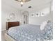 Spacious bedroom with a dresser, decor, large windows, and neutral walls for a serene atmosphere at 6777 Mariposa St, Denver, CO 80221