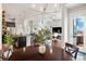 An open-concept dining room that seamlessly connects to the kitchen and living area at 6777 Mariposa St, Denver, CO 80221