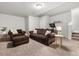 Cozy basement living room with comfortable seating and ample space for relaxation at 6777 Mariposa St, Denver, CO 80221