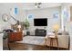 An inviting living room with ample natural light and modern furnishings at 6777 Mariposa St, Denver, CO 80221