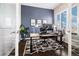 Modern office with a large window, stylish desk, and contemporary decor at 6777 Mariposa St, Denver, CO 80221