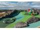 Community playground featuring a large slide, climbing area, and other fun amenities at 6777 Mariposa St, Denver, CO 80221
